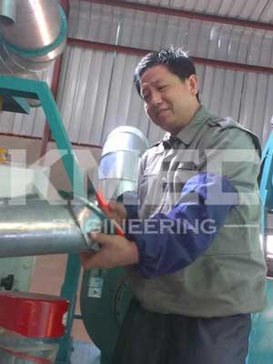 technical experts debugging maize flour milling machine